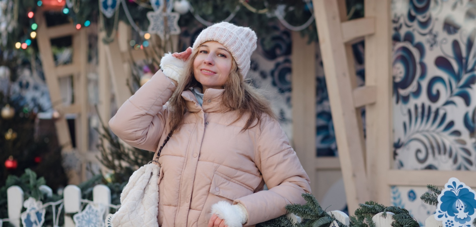 Promoting Christmas funfairs and fairgrounds Woman at Christmas funfair