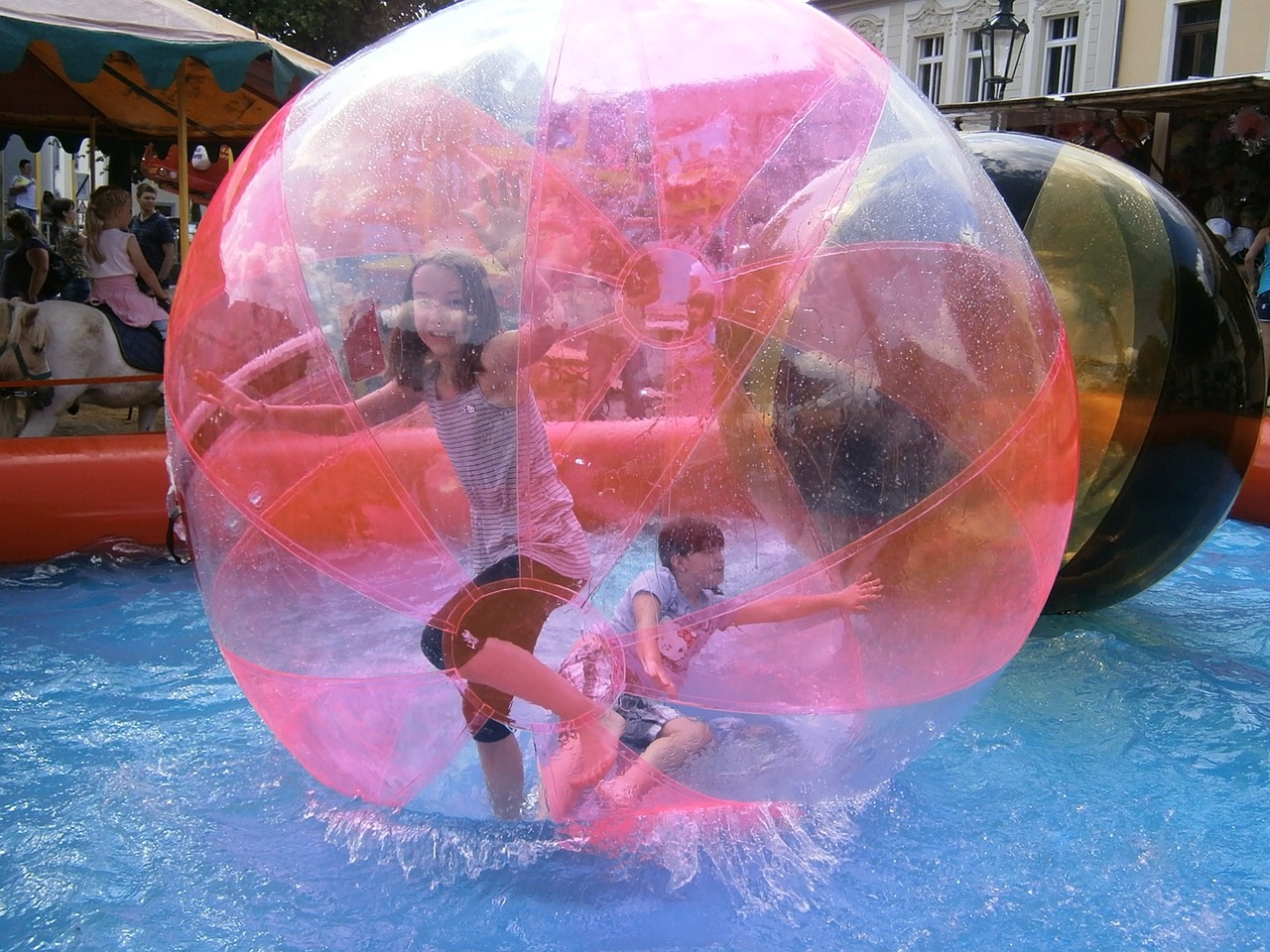Hire Water Zorbs and other funfair rides with We Are Tricycle Water Zorb funfair rides for hire for The Twelfth Battle of the Boyne